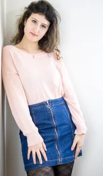 Female model posing on wall Stock Photos