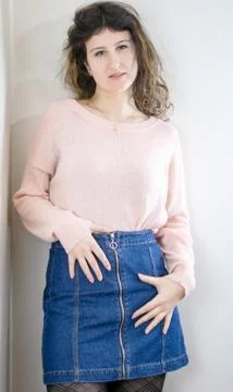Female model posing on wall Stock Photos
