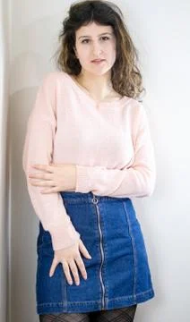 Female model posing on wall Stock Photos