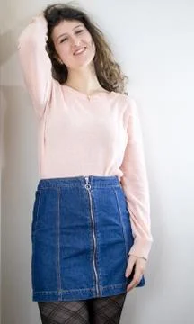 Female model posing on wall Stock Photos