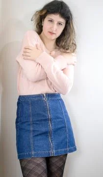 Female model posing on wall Stock Photos