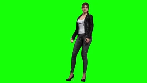 Female model shifting weight in stylish pose on green screen chromakey Stock Footage 328636367