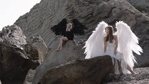 Female models in the image of angels Stock Footage 163983889