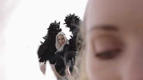 Female models in the image of angels Stock Footage 166685018
