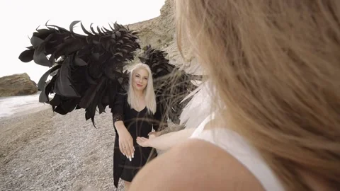 Female models in the image of angels Stock Footage 168983451