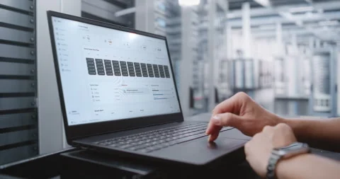 Female Network Engineer Reviewing Real Time Server Health and Data Center Stock Footage 344954554