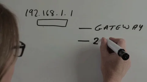 Female network Ethernet engineer designing network on whiteboard Stock Footage 114350219