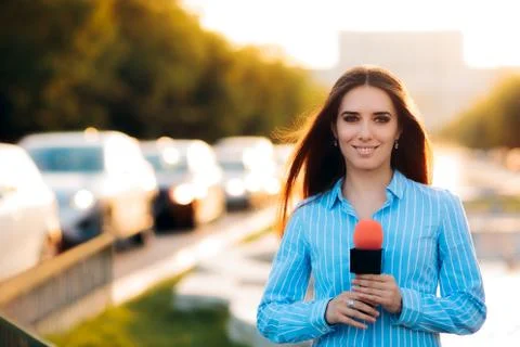 Female News Reporter on Field in Traffic Stock Photos