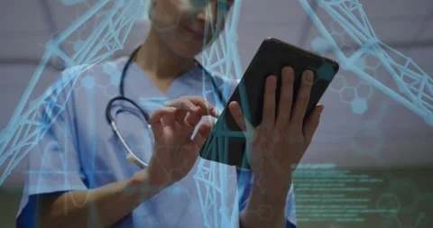 Female nurse holding tablet, tapping, swiping, causing blue helix and code Stock Footage 334311971