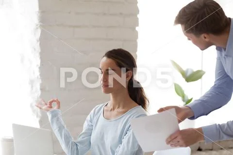 Female office worker keep calm when angry boss shout Stock Photos