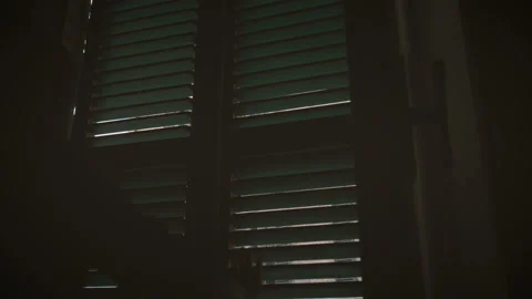 Female opens shutters of old window looking the street old Italian town Stock Footage 96789843