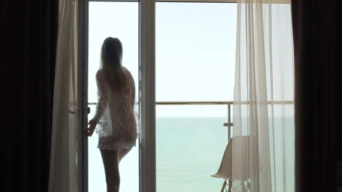 Female Opens the Window White Transparent Curtains and Goes Out to the Balcony t Stock-Footage 244917366