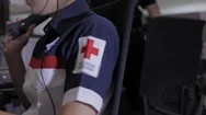 Female Operator Of The Red Cross On The Call Center. Stock Footage