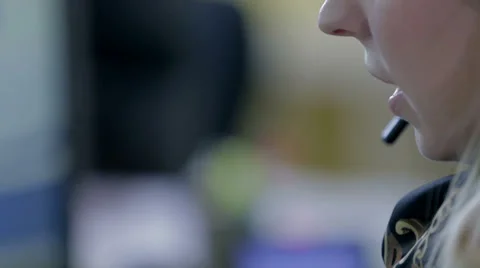 Female operator takes a call from a client Stock Footage 35398573