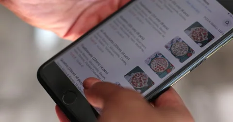 Female Ordering pizza using food delivery app. Stock Footage 194473282