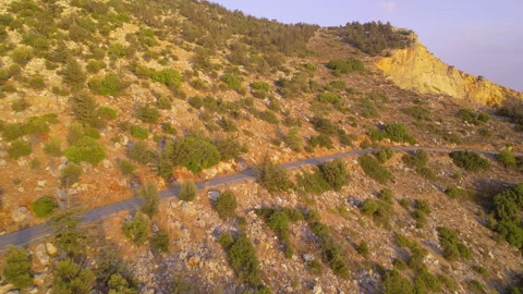 Female with Overweight Doing Cardio Training by Running in Mountains During Stock Footage 329931038