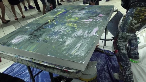 Female painter at work in a mall 스톡 동영상 76033441