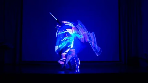 Female performs LED show at night. Stock Footage 69869876