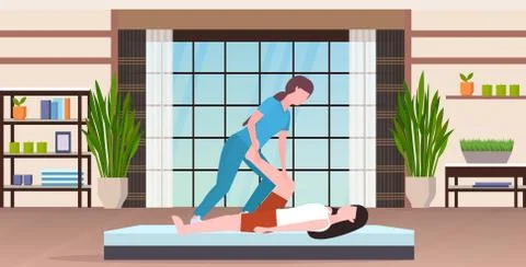 Female personal trainer doing stretching exercises with girl fitness instructor Illustrazione stock