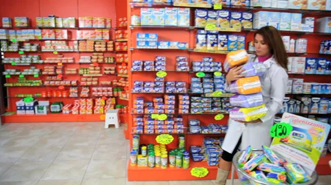 Female pharmacist dropping stuff funny scene in pharmacy Stock Footage 36964353