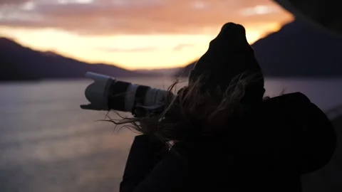 Female Photographer Aiming Camera Back of Cruise Ship Close Up Slow Motion Stock Footage 277920201