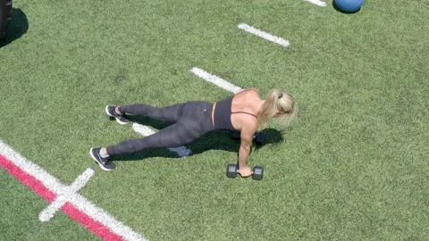 Female Physical Trainer Exercising Working Out Full Body Weights Aerial Drone Stock Footage 154384352