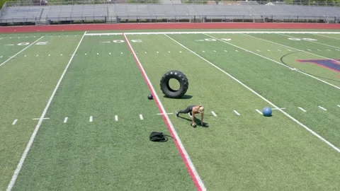 Female Physical Trainer Exercising Working Out Full Body Weights Aerial Drone Stockbeeldmateriaal 154384370