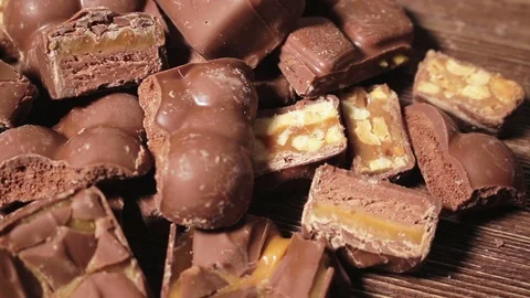 Female Picking One Of Many Different Chocolate Stock Footage 70566054