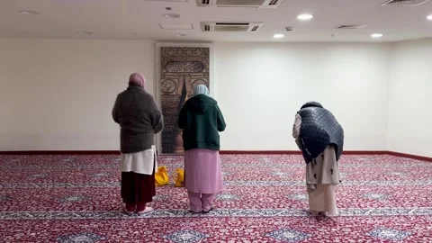Female pilgrims pray Stock Footage 295942007