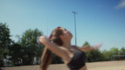 Female player serving ball in beach volleyball 스톡 동영상 115763547
