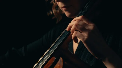 Female Playing Cello Stock Footage