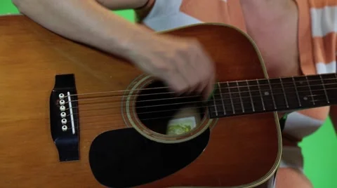 Female playing guitar, close up Stock Footage 57787134
