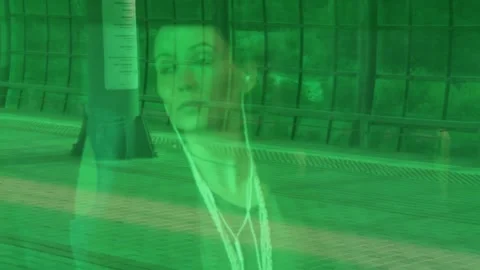 Female portrait through the window of train. The train moves off the platform. Stock Footage 146833001