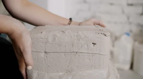 Female potter master preparing the clay on table. 스톡 동영상 66774761