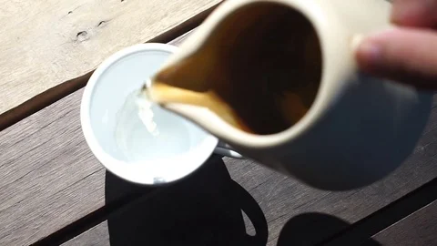 Female pouring tea Stock-Footage 70574136