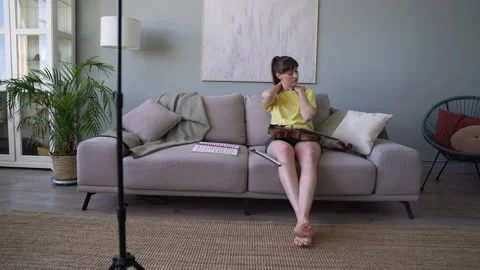 Female practising at home, having a rest, making self-massage for back. Stock Footage 155108497