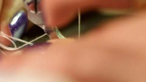 Female preparing sewing machine for work close up Video stock 23130799