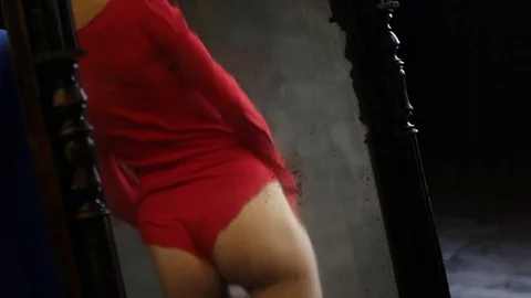 A female priest in the reflection of an old mirror. Stock Footage 84660034