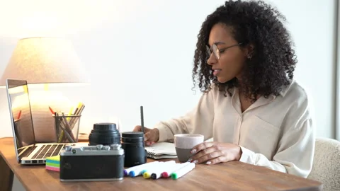 Female professional user using laptop doing online job in home office Stock Footage 170761635
