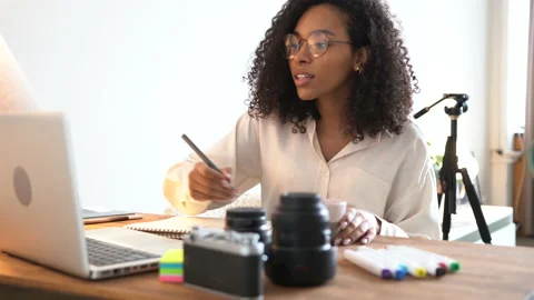 Female professional user using laptop doing online job in home office Stock Footage 170761783