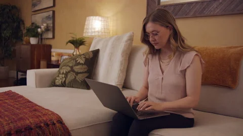 Female Professional Work From Home Study Remote on Couch Living Room 24fps 01 Stock Footage 188031425