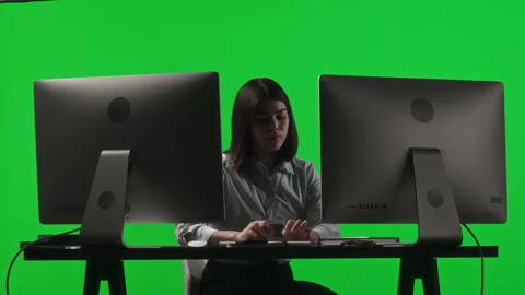 Female Programmer Coding on Computer with Dual Monitor on Chroma Key Background Stock-Footage 268817366