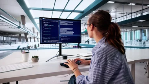 Female Programmer Coding On Computer: Inspiring Women Stock Footage 314131257