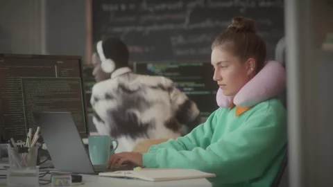 Female Programmer Coding on Laptop at Office Workplace Stock Footage 263701106