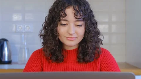 Female programmer coding on notebook computer at home in 4k stock video clip Stock Footage 219689923