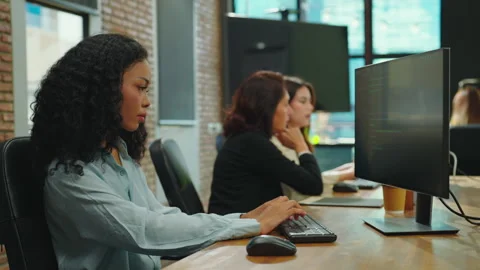 Female programmer is coding in office. Stock Footage 242812592