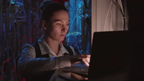 Female Programmer Coding in Server Room Stock Footage 155677449