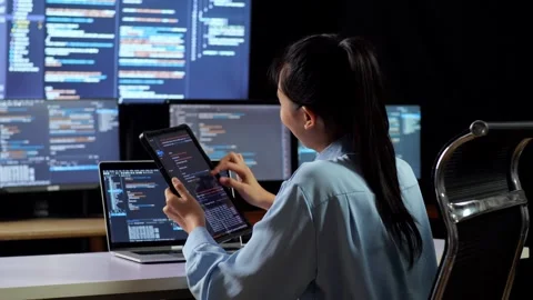 Female Programmer Look Database On Tablet Writing Code Laptop Multiple Monitors Stock Footage 244424424