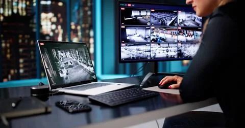 The Female Programmer: Mastering Code On Laptop And Desktop Stock Photos