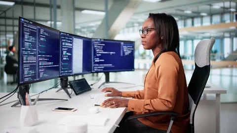 The Female Programmer In The Office Writing Code Stock Footage 318758156